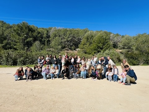 Large family and friends group photo at a Paradise Stables celebration