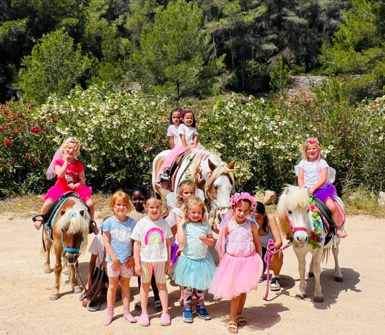Group of children with unicorns at Paradise Stables